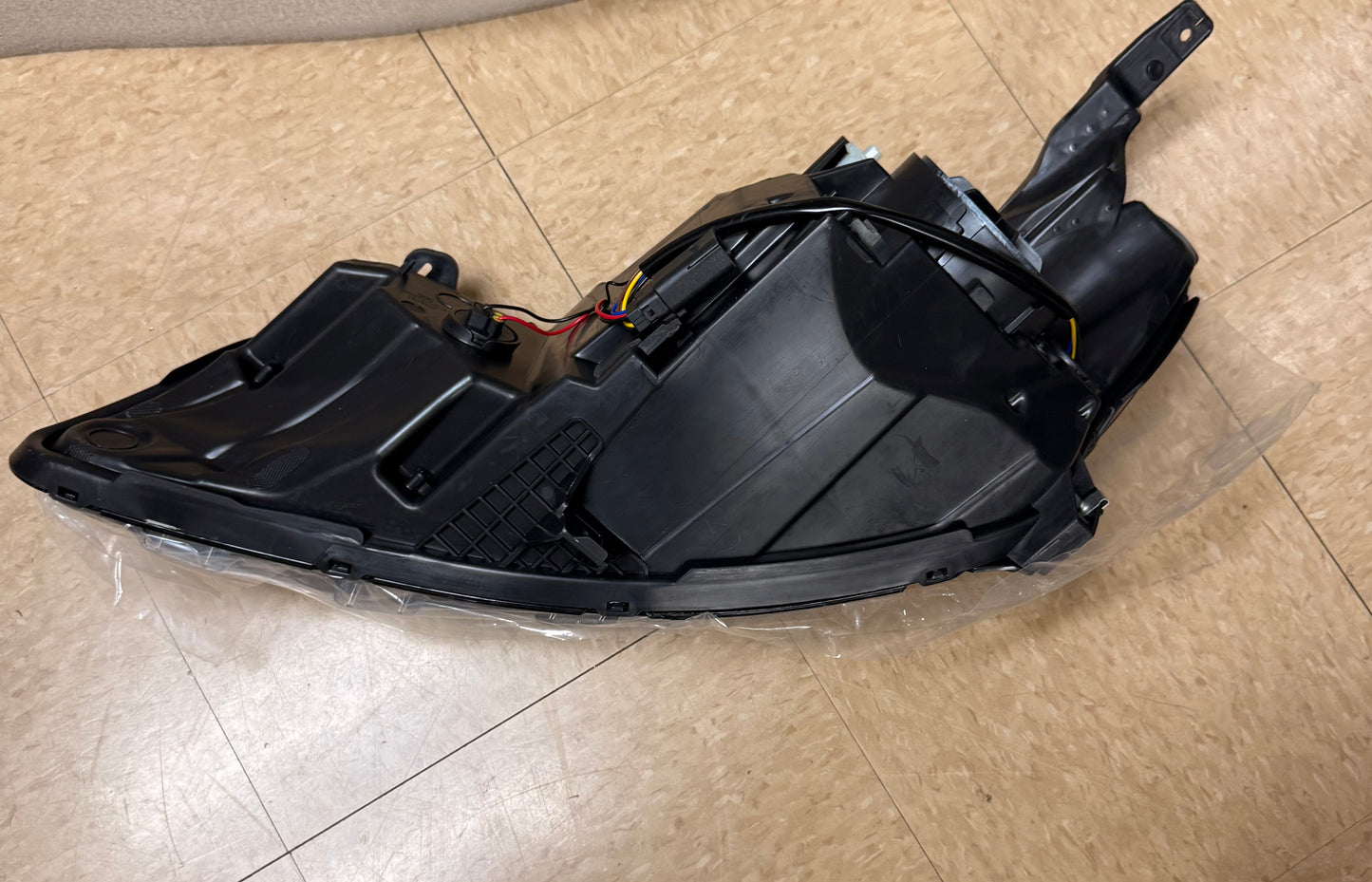 Front Right (Passenger Side) Halogen Headlight Assembly for a 2016–2018 Chevrolet Malibu.