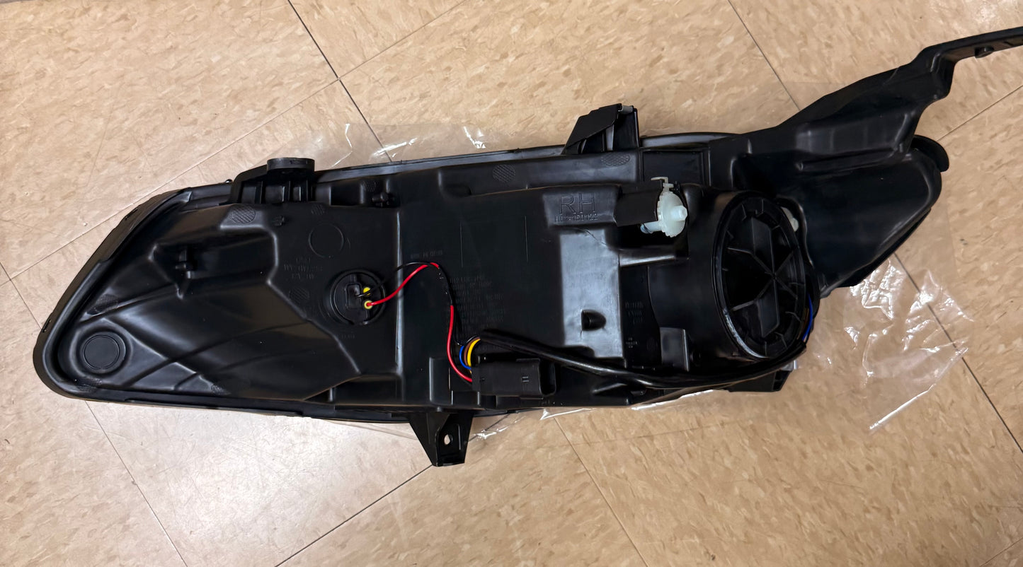 Front Right (Passenger Side) Halogen Headlight Assembly for a 2016–2018 Chevrolet Malibu.